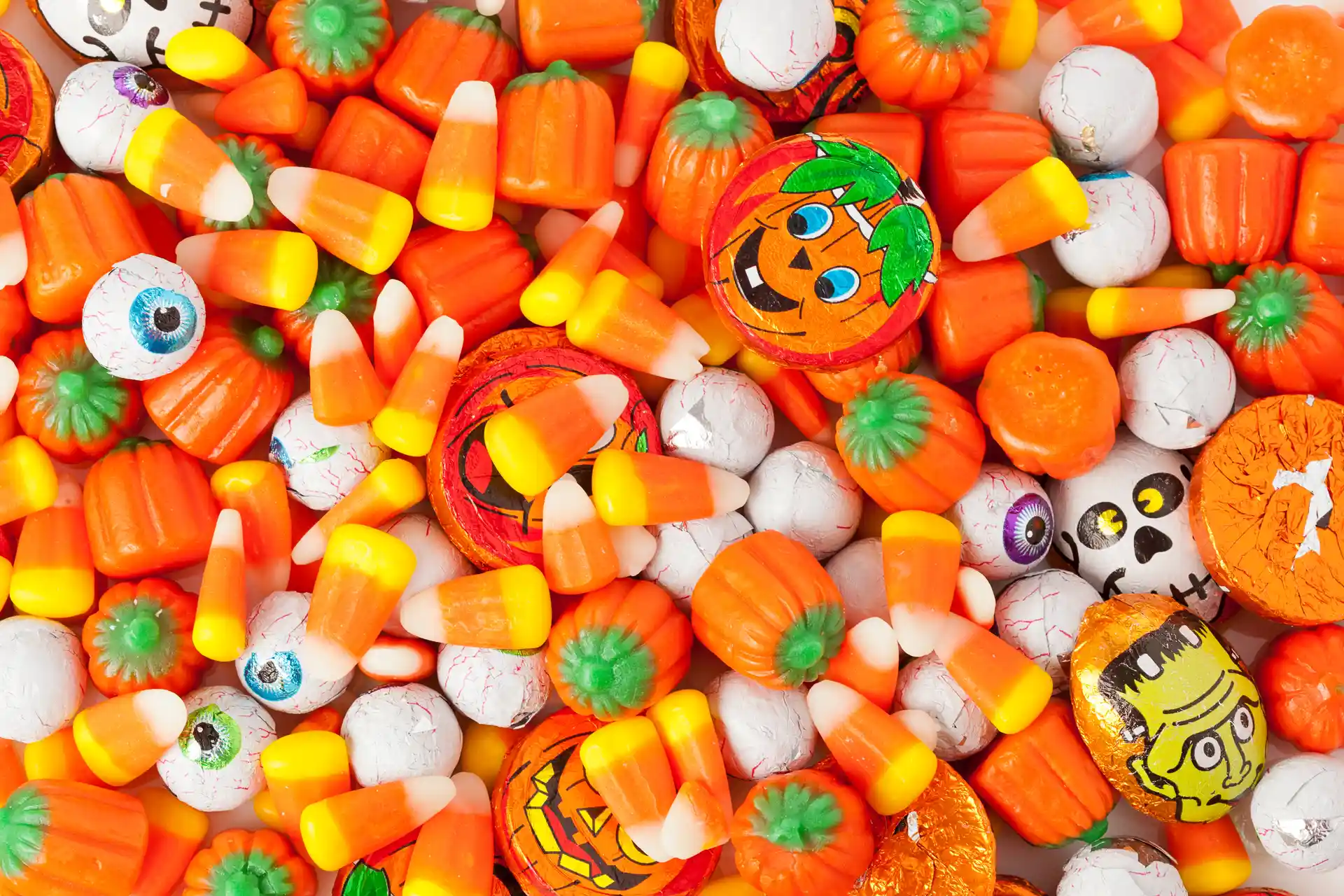 a pile of assorted halloween candies